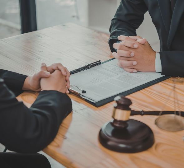 Lawyer discussing case with client